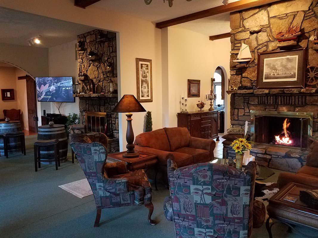 Tuscan Manor Lounge Area Fireplace 1